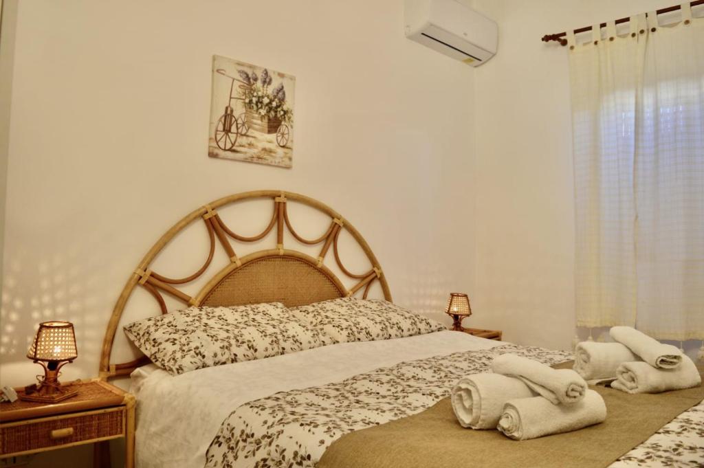 Postel nebo postele na pokoji v ubytování Villa Rosetta vacanze al mare