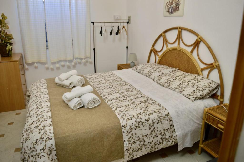 Postel nebo postele na pokoji v ubytování Villa Rosetta vacanze al mare