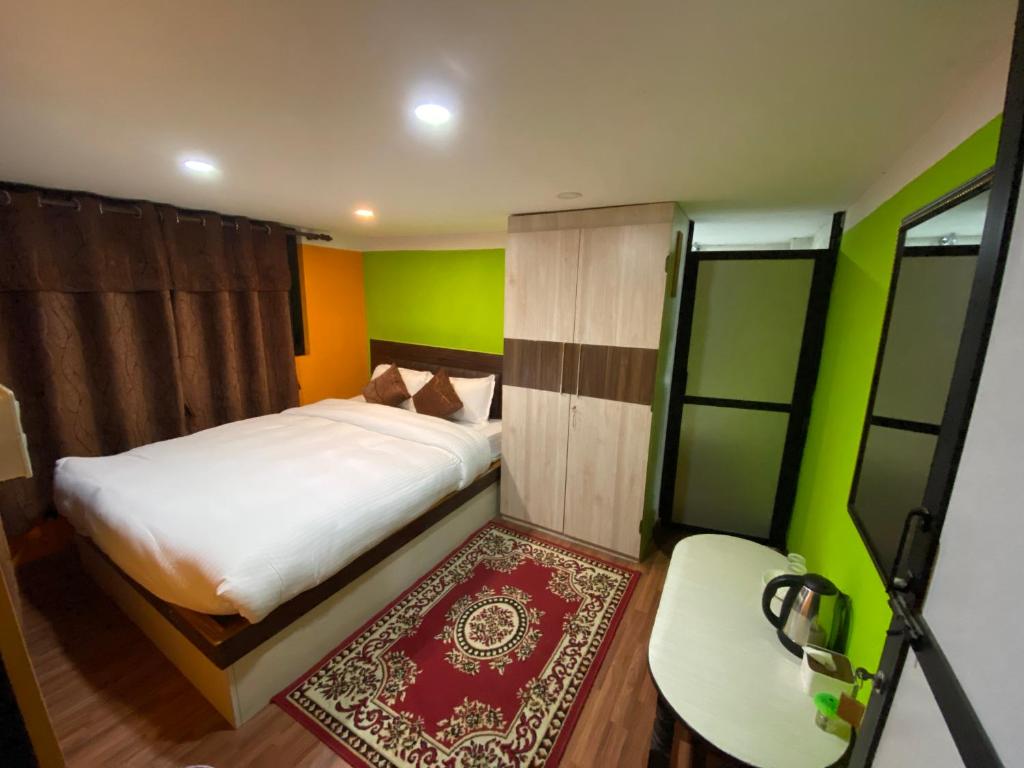Postel nebo postele na pokoji v ubytování Chareli Resort