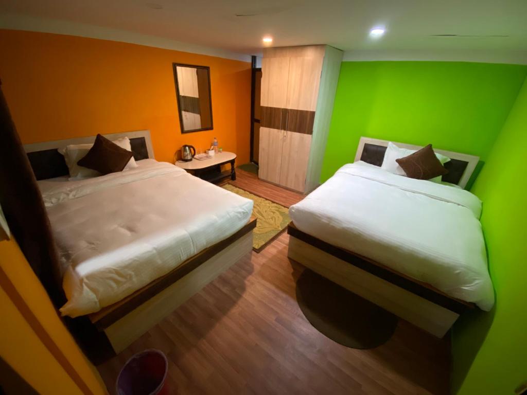 Postel nebo postele na pokoji v ubytování Chareli Resort