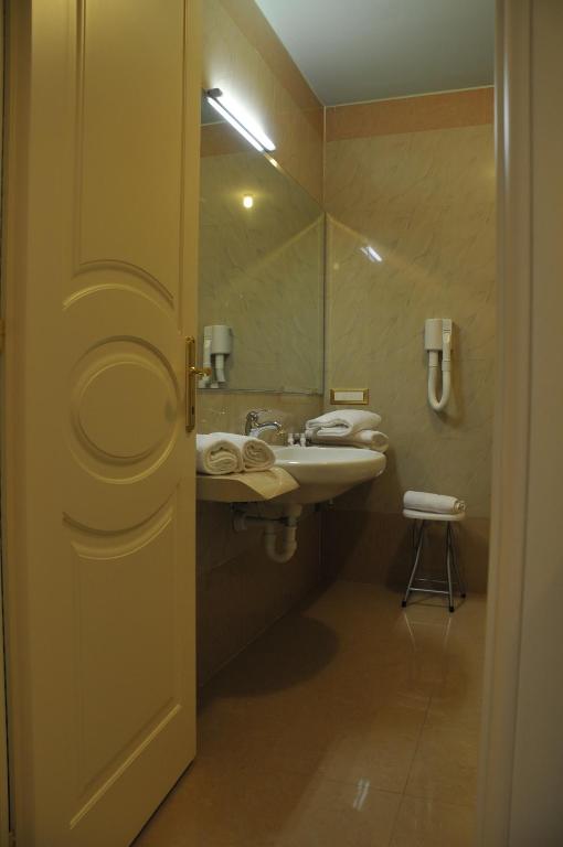 Koupelna v ubytování Hotel Verdi