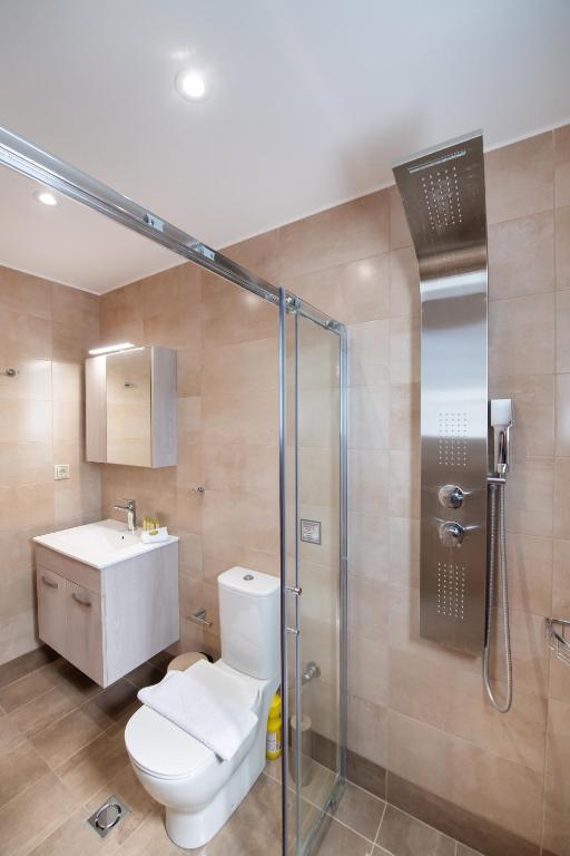 Kúpeľňa v ubytovaní Ruellia Luxury Apartments