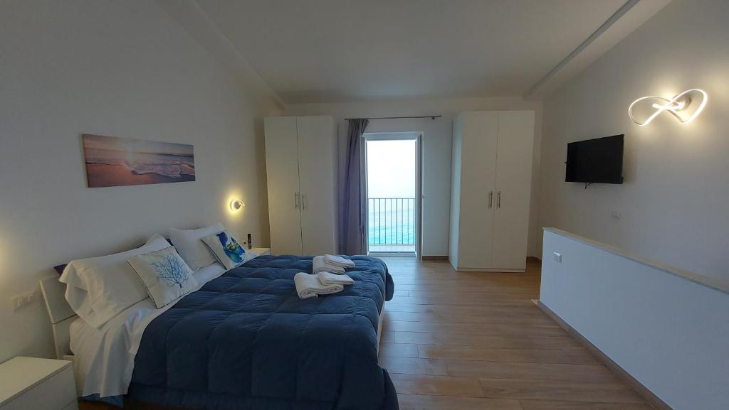 Posteľ alebo postele v izbe v ubytovaní Marina House