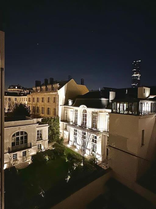 an aerial view of a building at night at ECRIN AU COEUR DE PARIS PRES DU JARDIN DU LUXEMBOURG in Paris