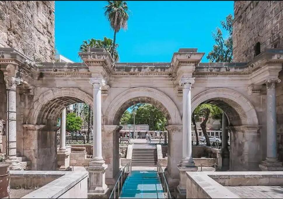 an archway in a building with a pool of water at Furnished Apartment [Mounthly Discount] D4 in Antalya
