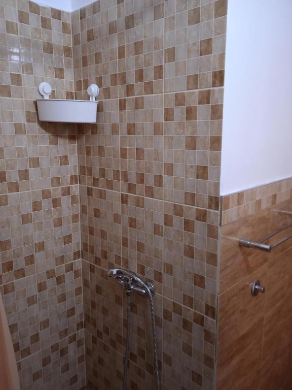 Vannas istaba naktsmītnē SMEŠTAJ SOLARIS kod Aqua Parka Studio Apartmani