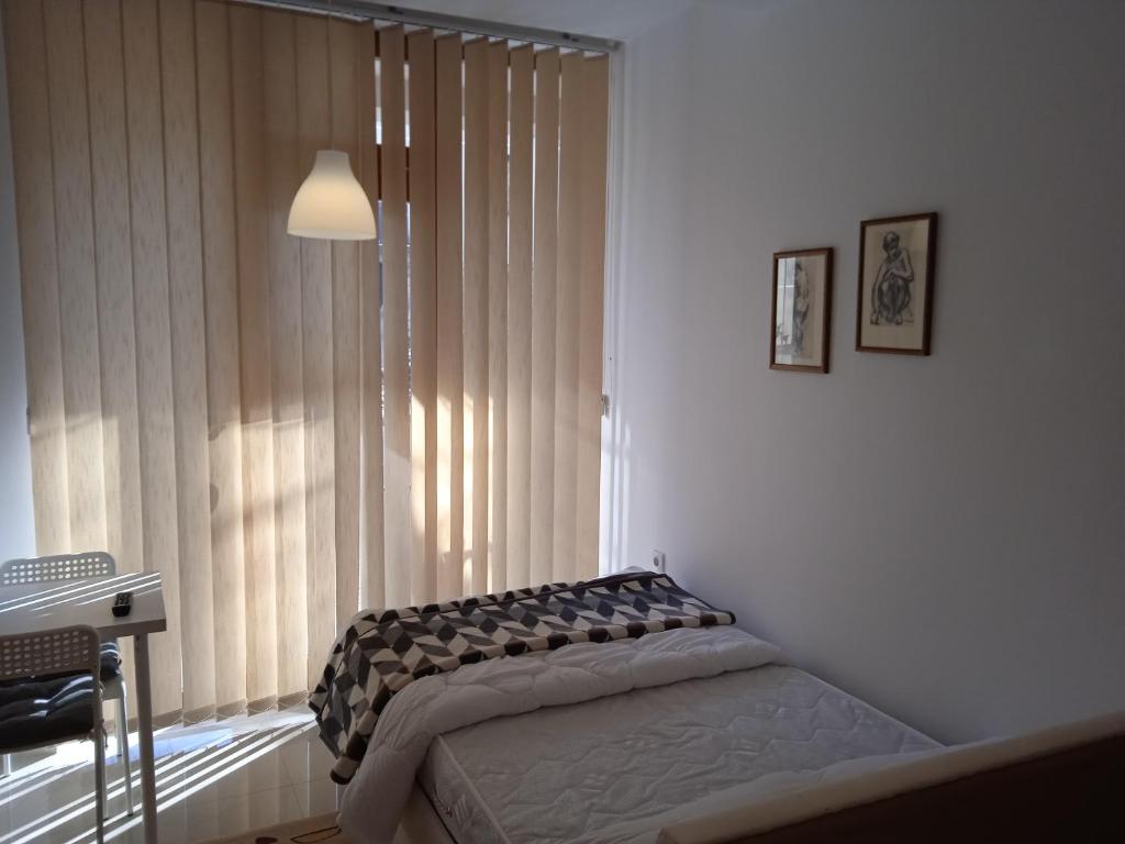 Gulta vai gultas numurā naktsmītnē SMEŠTAJ SOLARIS kod Aqua Parka Studio Apartmani