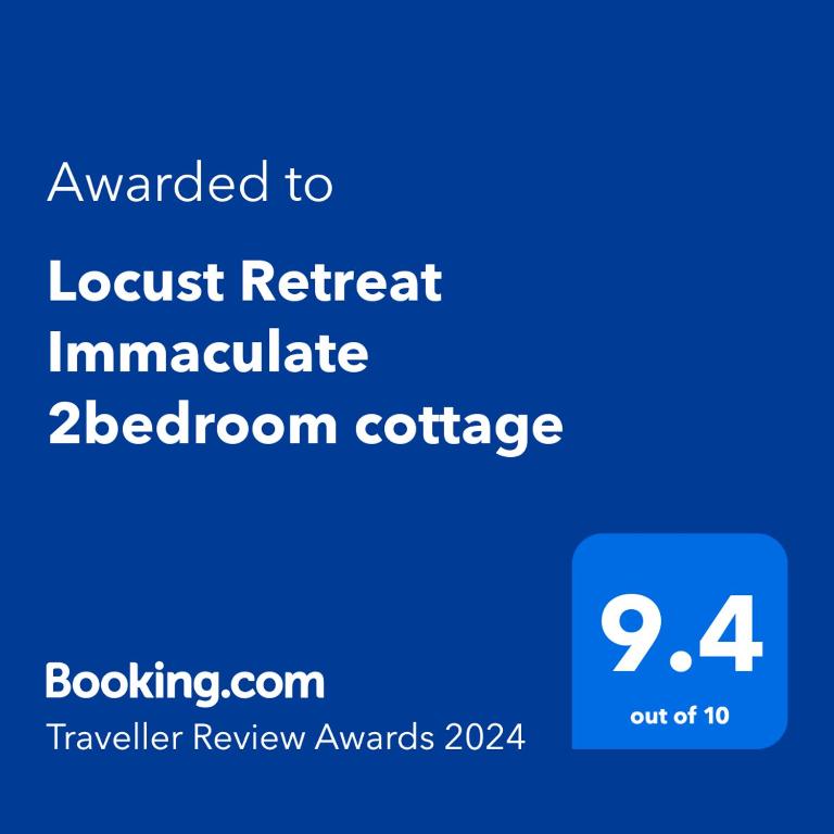 a screenshot of a phone with the text awarded to locust retreat immaculate at Locust Retreat Immaculate 2bedroom cottage in Marloth Park