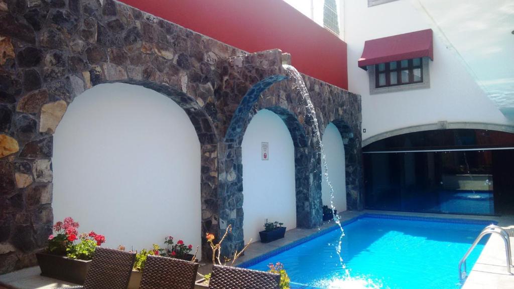 Bazén v ubytování Hotel San Xavier nebo v jeho okolí