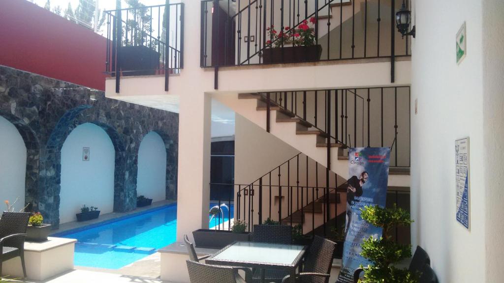 Bazén v ubytování Hotel San Xavier nebo v jeho okolí