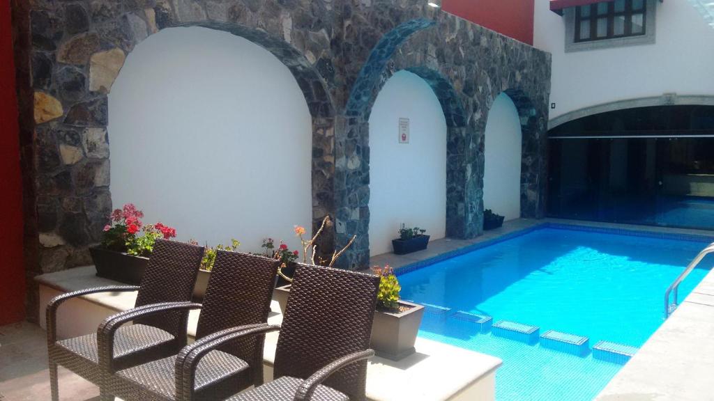 Bazén v ubytování Hotel San Xavier nebo v jeho okolí