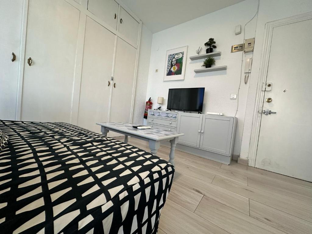 Televízia a/alebo spoločenská miestnosť v ubytovaní CG131 - Centro 50 metros, Playa 650 metros, Wifi, Fire Stick Amazon