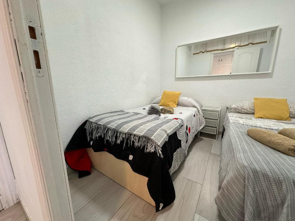 Posteľ alebo postele v izbe v ubytovaní CG131 - Centro 50 metros, Playa 650 metros, Wifi, Fire Stick Amazon