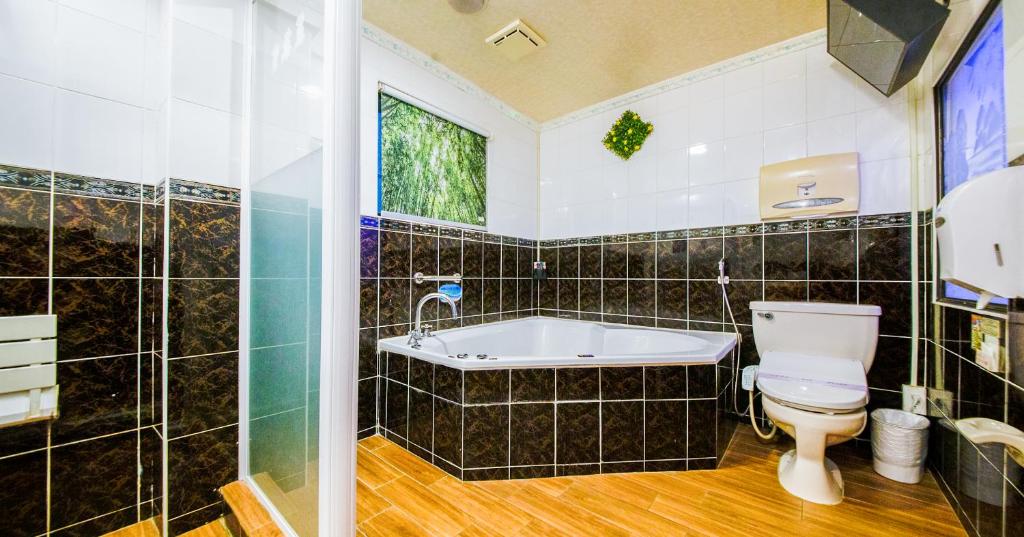 Koupelna v ubytování Wen Sha Bao Motel-Xinying