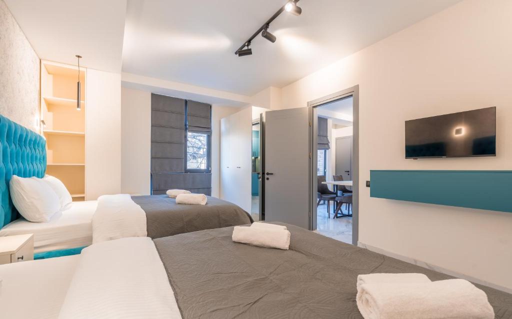 Postel nebo postele na pokoji v ubytování Luxury X By Umbrella