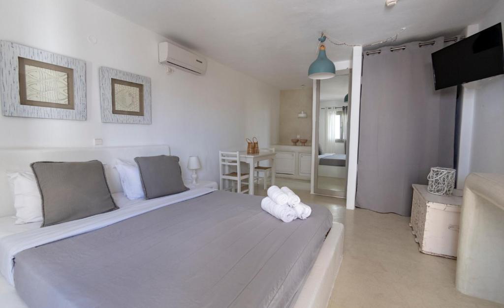 Postel nebo postele na pokoji v ubytování Anemoi Resort