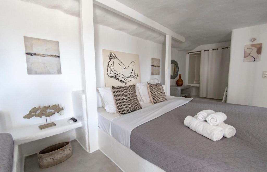 Postel nebo postele na pokoji v ubytování Anemoi Resort
