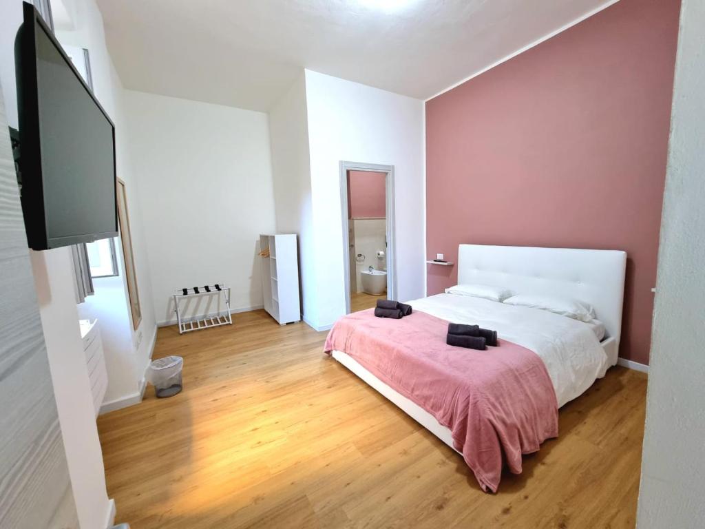 Postel nebo postele na pokoji v ubytování Morfeo B&B