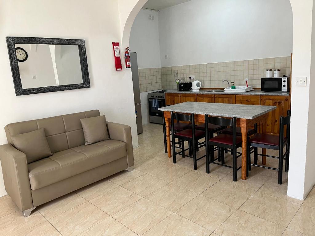 Kuchyň nebo kuchyňský kout v ubytování Gozo Belle Mare Apartments