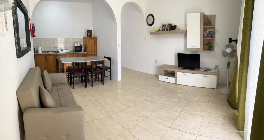 Kuchyň nebo kuchyňský kout v ubytování Gozo Belle Mare Apartments