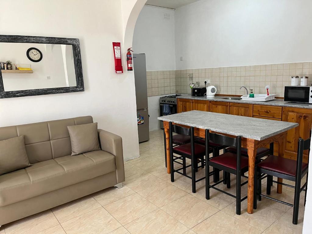 Kuchyň nebo kuchyňský kout v ubytování Gozo Belle Mare Apartments