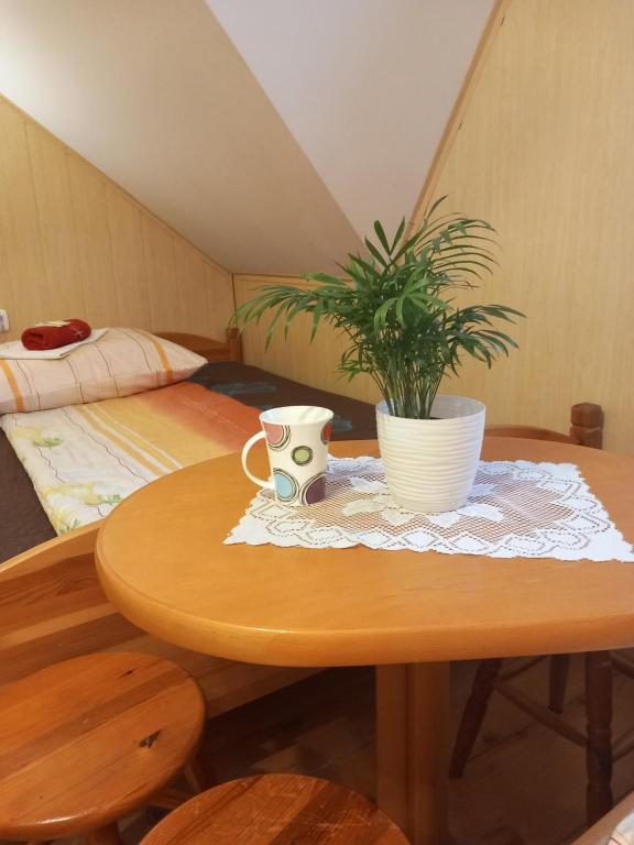 Postel nebo postele na pokoji v ubytování Agroturystyka Pod Złotą Wiechą