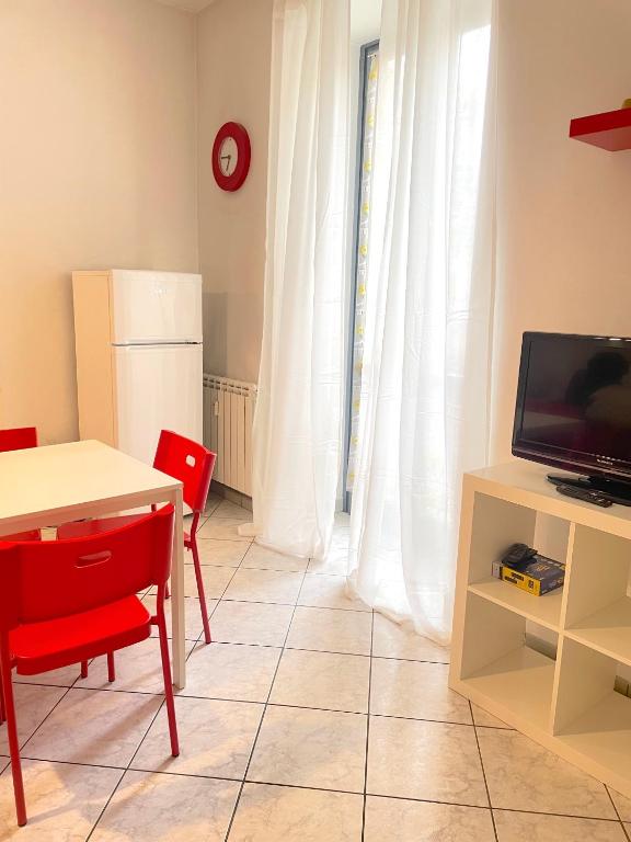 Televízia a/alebo spoločenská miestnosť v ubytovaní Gioberti