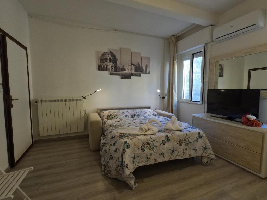 A bed or beds in a room at Il Merlo