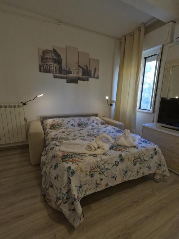 A bed or beds in a room at Il Merlo