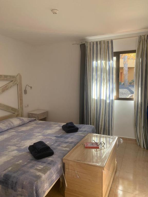 Postel nebo postele na pokoji v ubytování Casa Sotavento