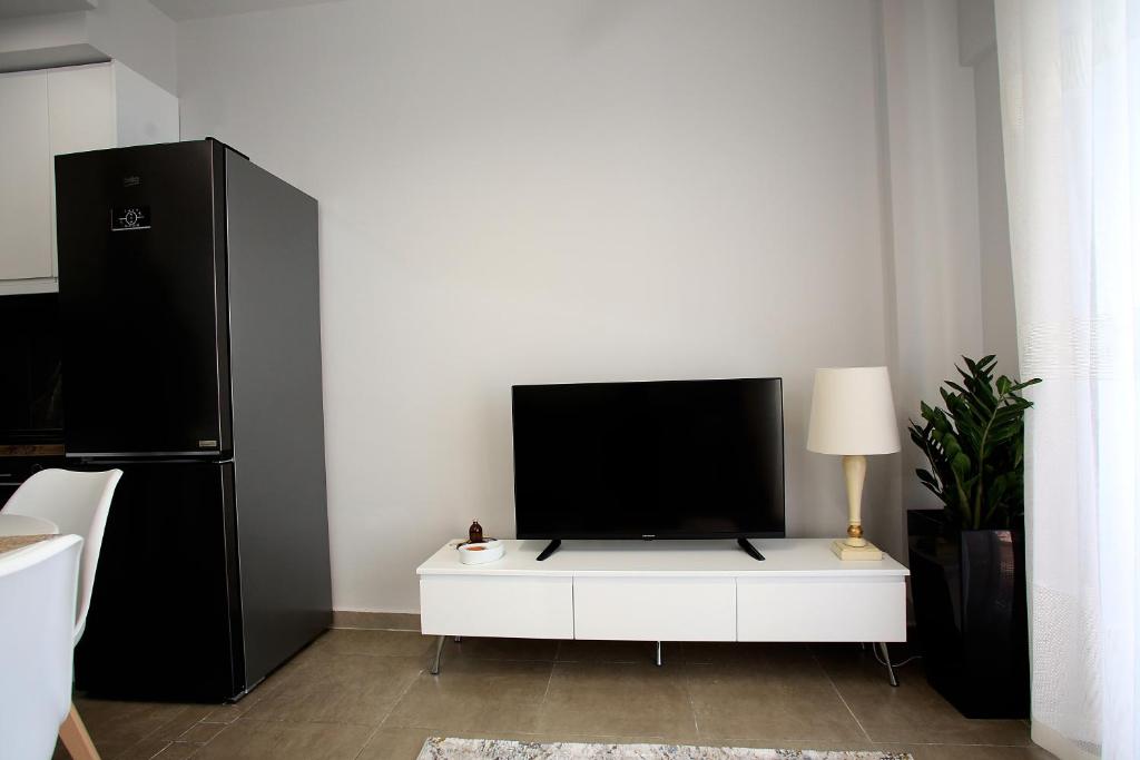 TV a/nebo společenská místnost v ubytování NOVA Sea View Apartments