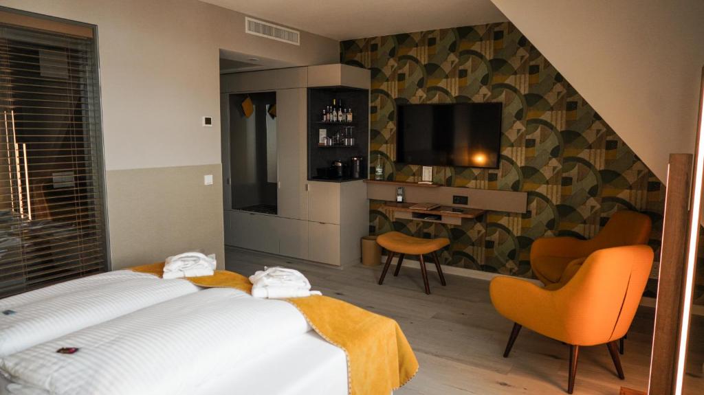 Postel nebo postele na pokoji v ubytování DAS KEHRS - Hotel auf dem Petersberg