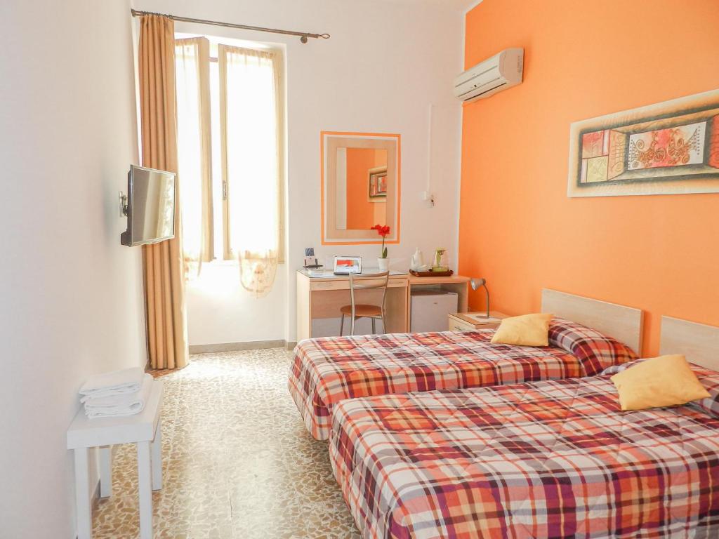 Postel nebo postele na pokoji v ubytování Actinia Accommodation
