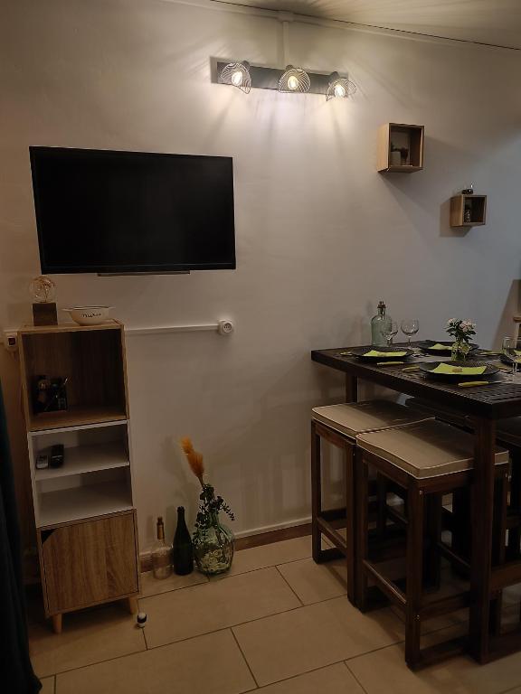 TV a/nebo společenská místnost v ubytování Poz Tropicale