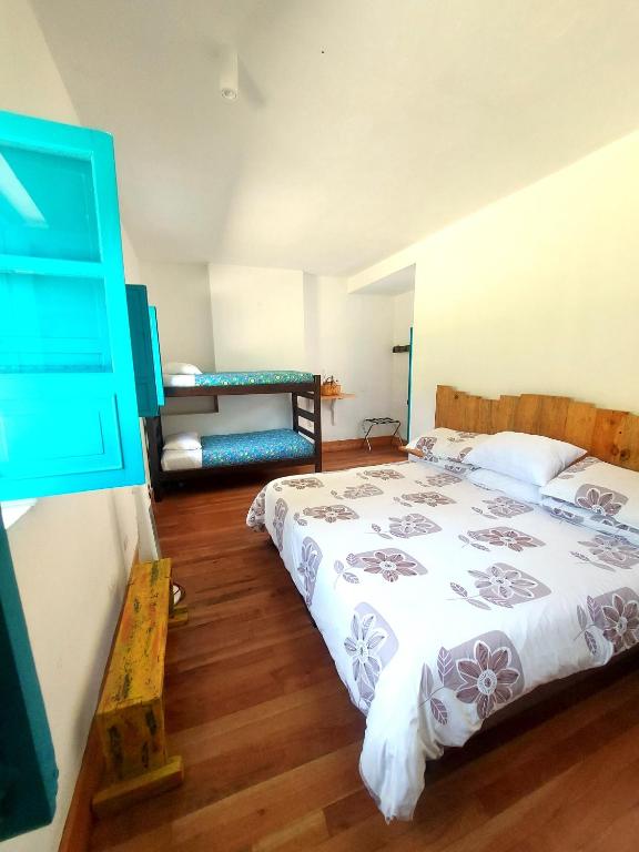 Postel nebo postele na pokoji v ubytování Hacienda Tocarema