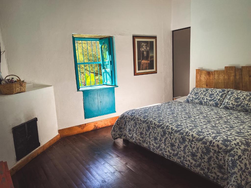 Postel nebo postele na pokoji v ubytování Hacienda Tocarema