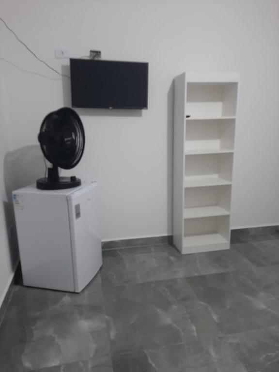 TV a/nebo společenská místnost v ubytování Pousada Belaisa