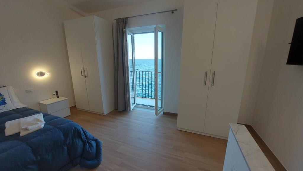 Posteľ alebo postele v izbe v ubytovaní Marina House