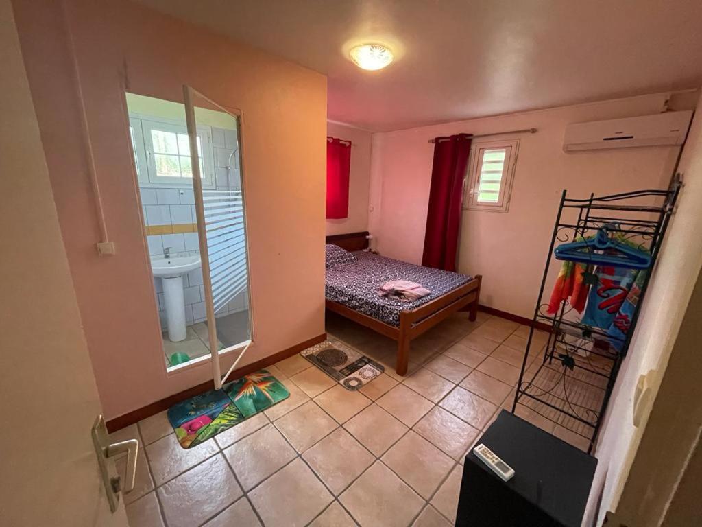 Postel nebo postele na pokoji v ubytování Villa yoyo poirier
