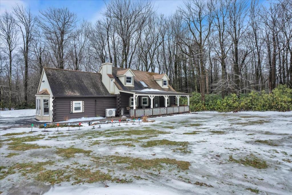 Log Cabin and Guest House Sleeps 18 2 Game Rooms durante el invierno