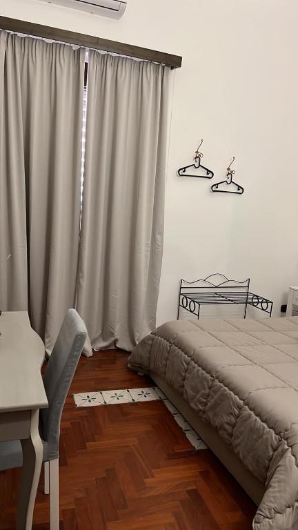 Postel nebo postele na pokoji v ubytování B&B IL CONTE