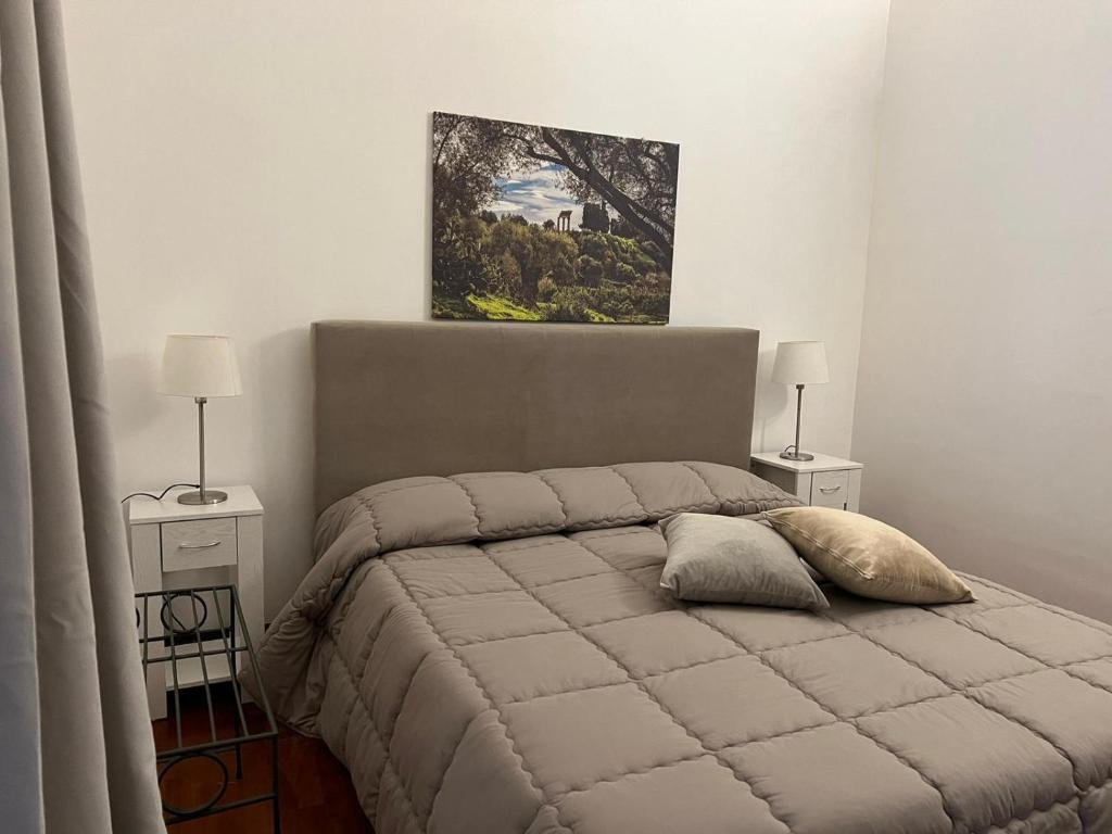 Postel nebo postele na pokoji v ubytování B&B IL CONTE