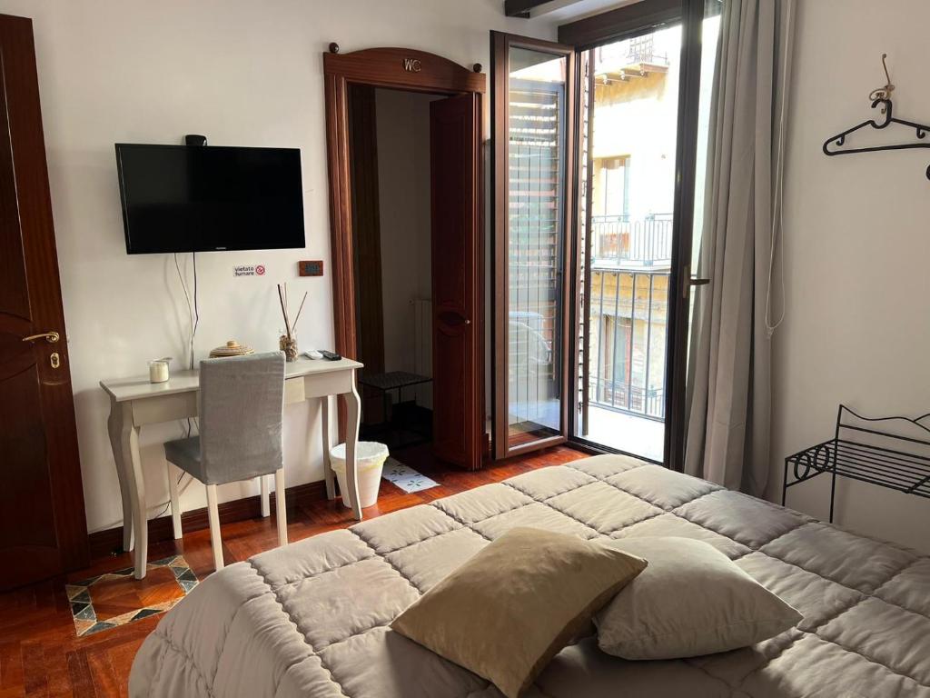 Postel nebo postele na pokoji v ubytování B&B IL CONTE