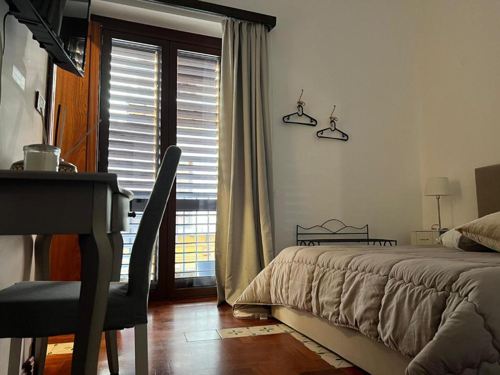 Postel nebo postele na pokoji v ubytování B&B IL CONTE