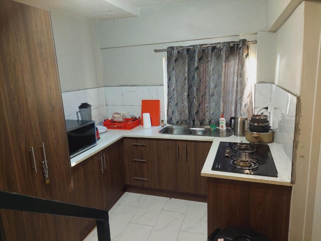 Cucina o angolo cottura di Double Bed