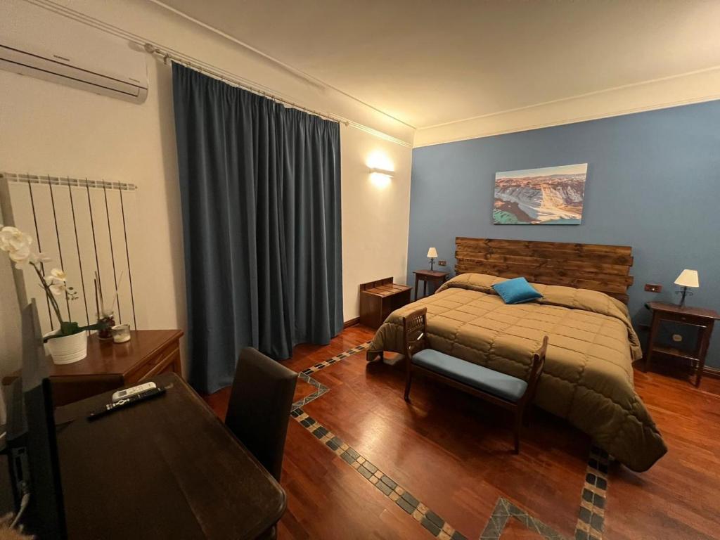 Postel nebo postele na pokoji v ubytování B&B IL CONTE