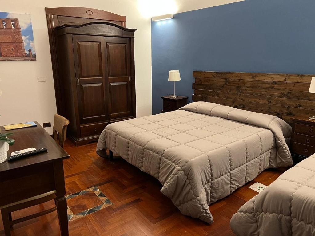 Postel nebo postele na pokoji v ubytování B&B IL CONTE