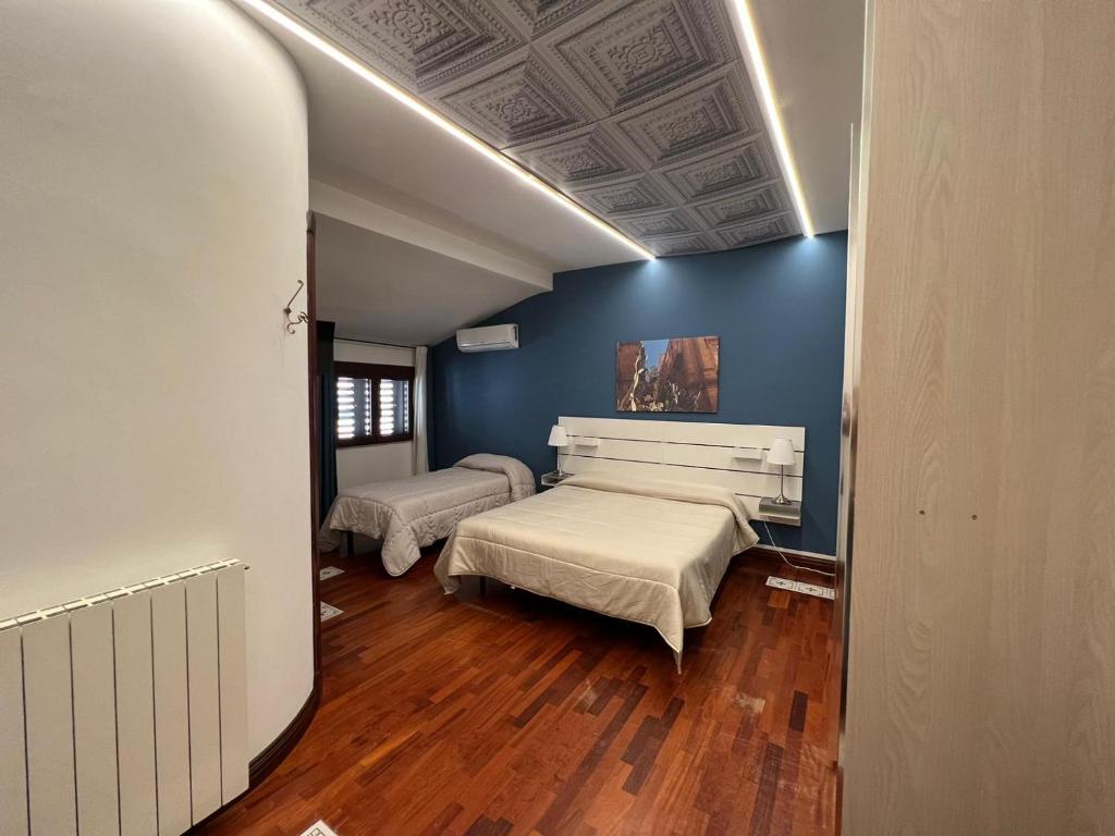 Postel nebo postele na pokoji v ubytování B&B IL CONTE