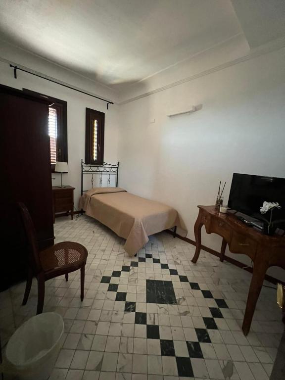 Postel nebo postele na pokoji v ubytování B&B IL CONTE