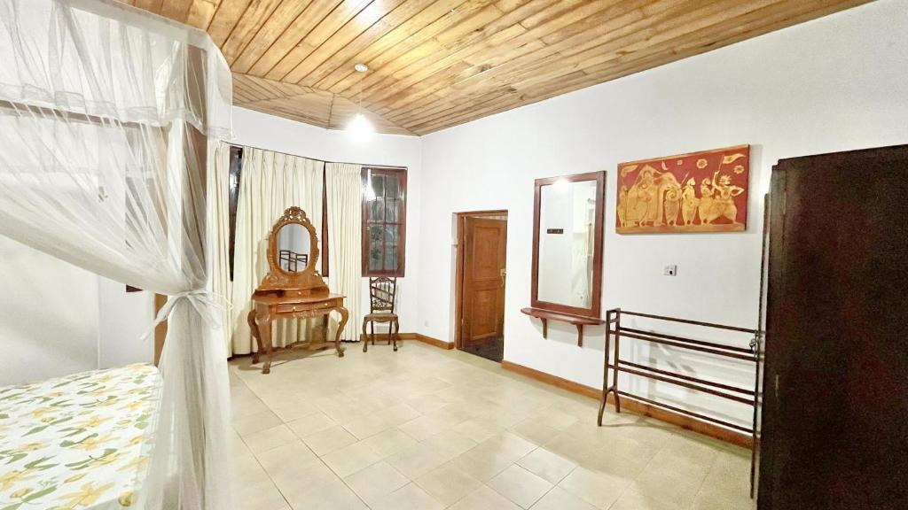 Postel nebo postele na pokoji v ubytování Pearl House
